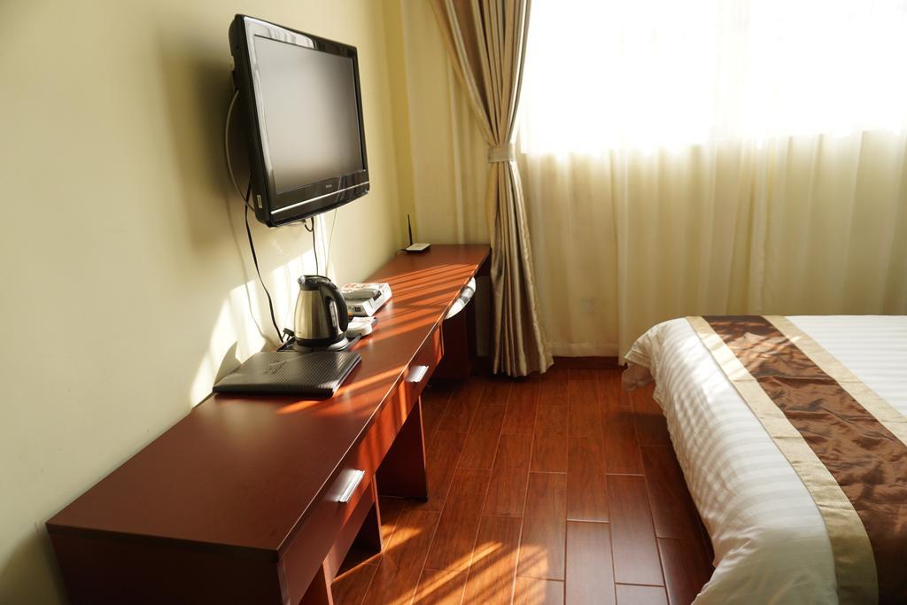 Guangdong Oversea Chinese Hotel Kuangcsou Szoba fotó